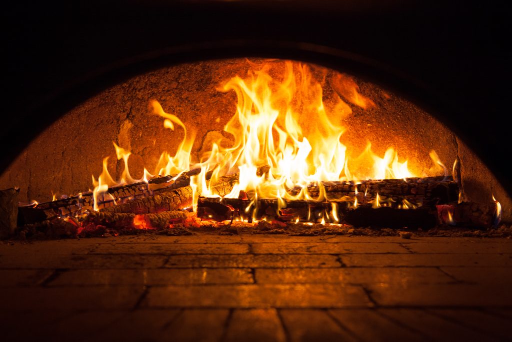 brick oven pizza fire
