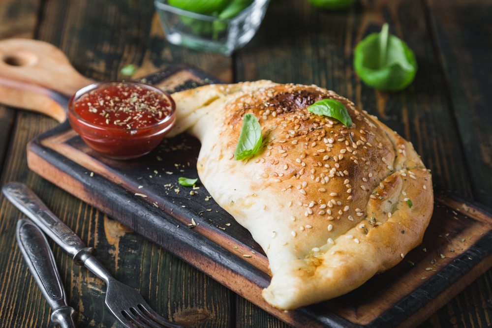 Calzone pizza with chicken and cheese