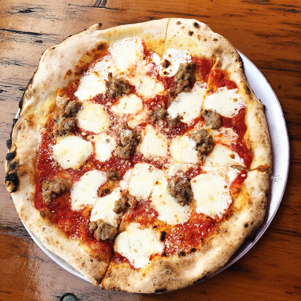 Cheese and sausage pizza in brooklyn