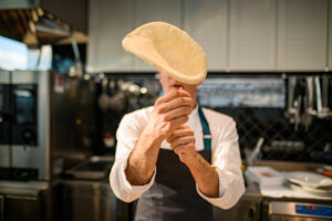 Hand-Tossed Pizza: The Art of Creating the Perfect Crust - Pizzaware