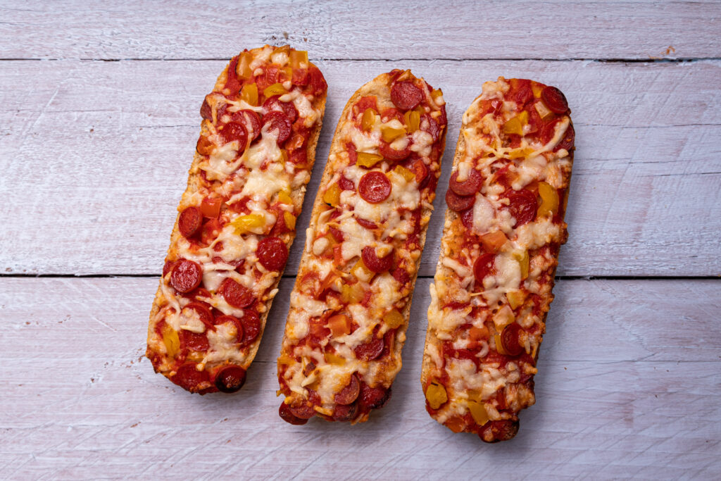 Pizza baguettes with salami