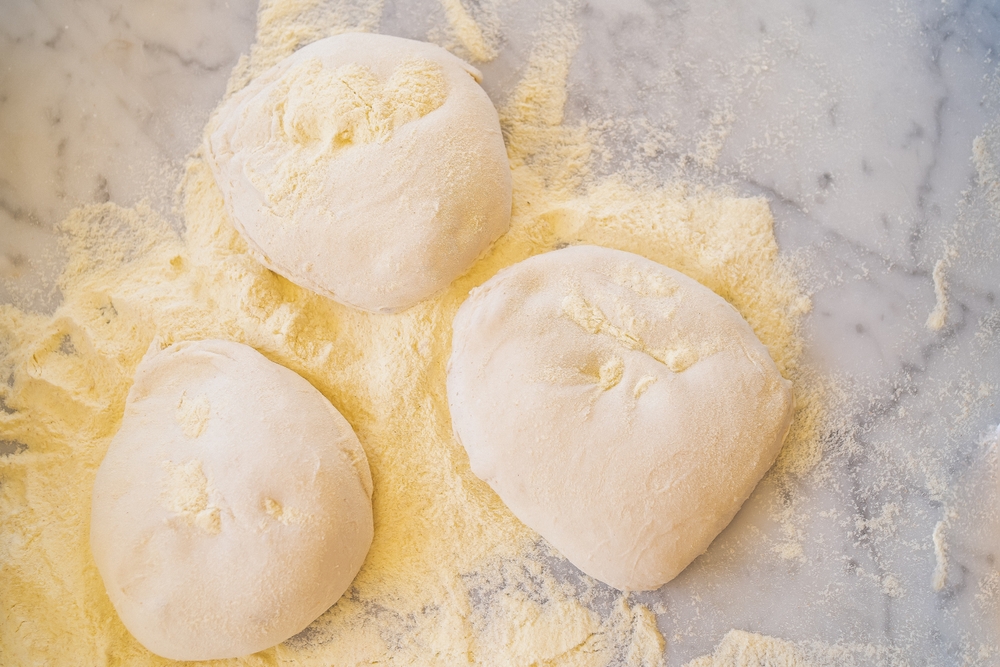 Semolina flour on pizza dough