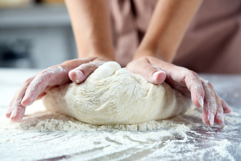 Kneading dough for pizza